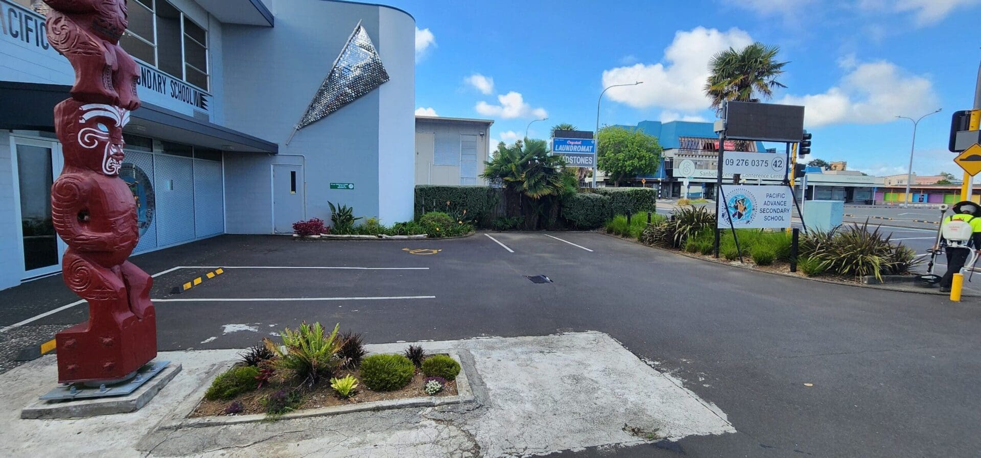 Commercial garden and property presentation maintained by Auckland Garden Services