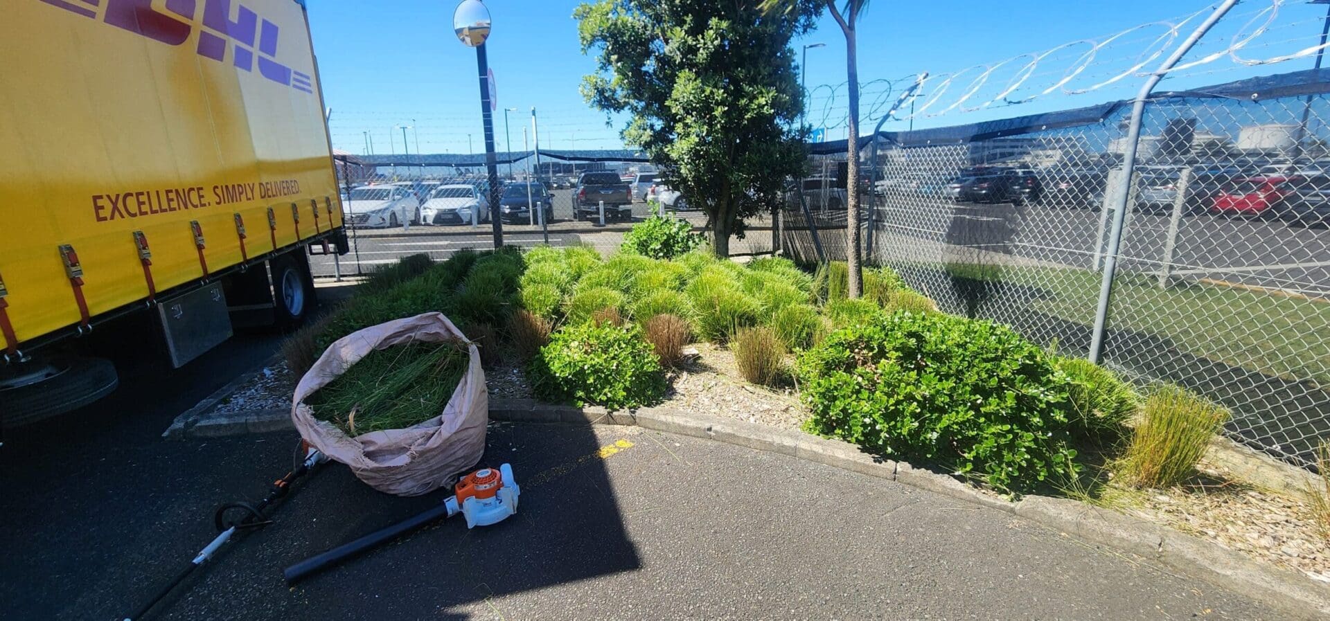Commercial grounds maintenance at a DHL property in Auckland